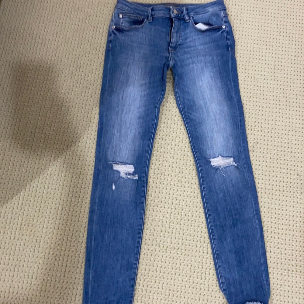 Tight low waisted ripped jeans